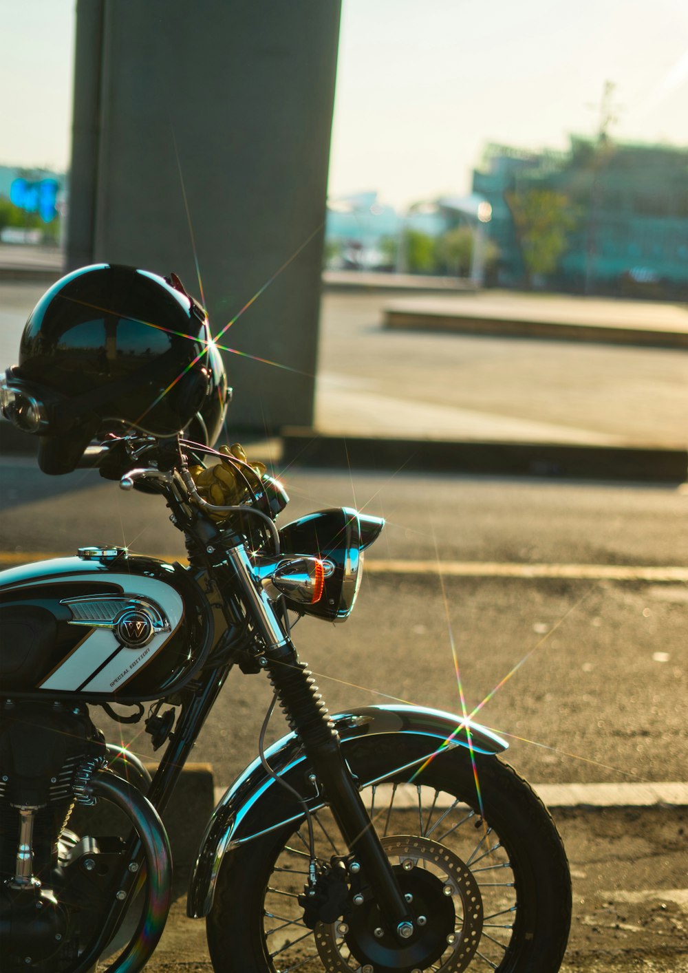 a motorcycle parked on the side of a road