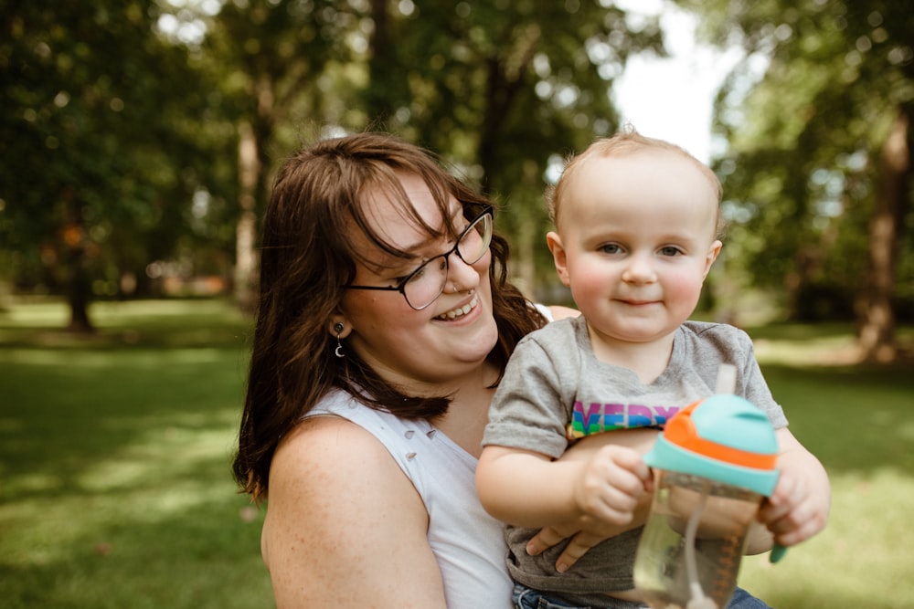 a person holding a baby