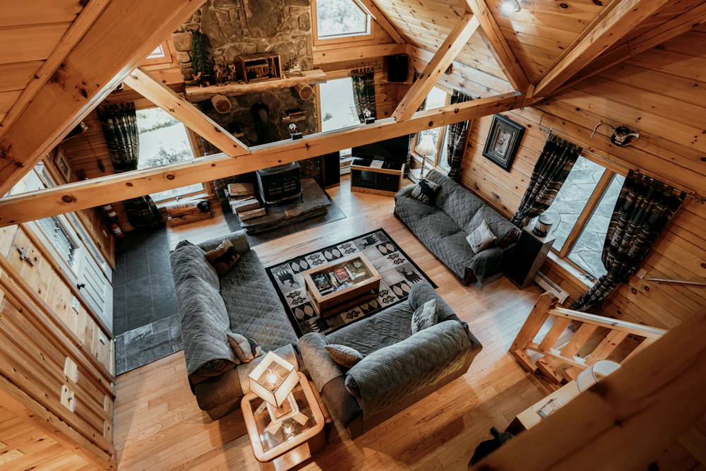 Timber-framed living room with a vaulted wood ceiling