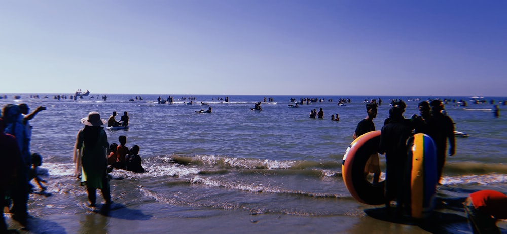 a group of people at the beach