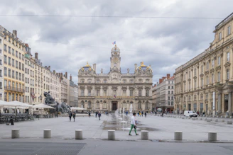 a large courtyard with buildings around it