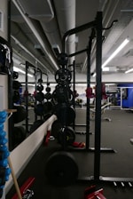 An engaging photo of a multigym setup in a modern fitness space.