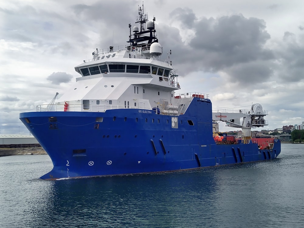 a large blue and white ship