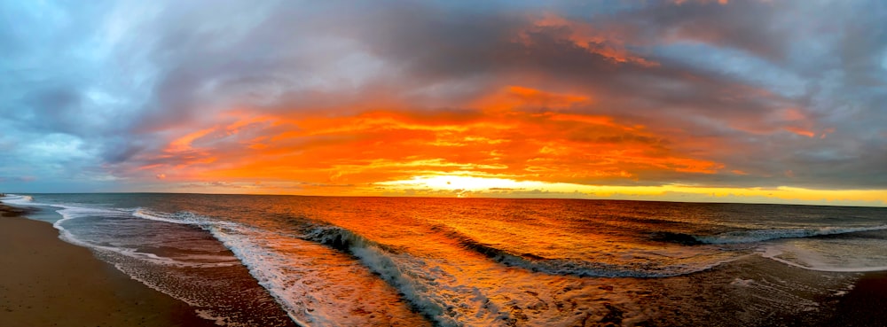 a beach with a sunset