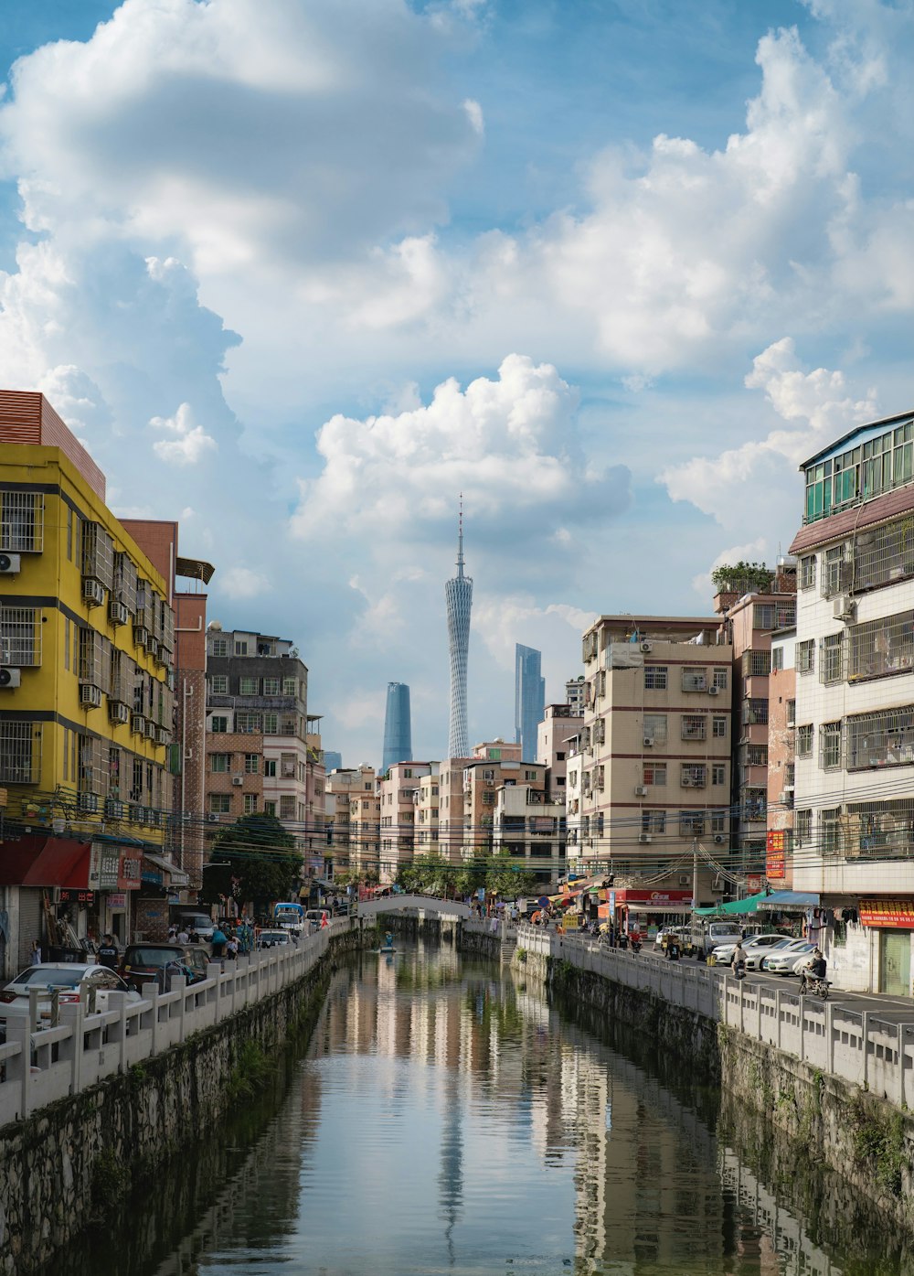 a river with buildings along it