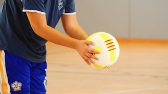 a person holding a ball