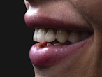 a person's mouth with teeth and tongue sticking out