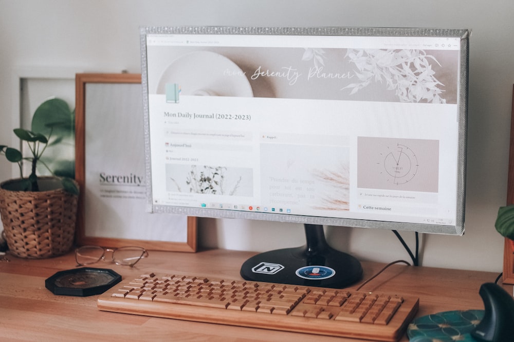 a computer monitor and keyboard