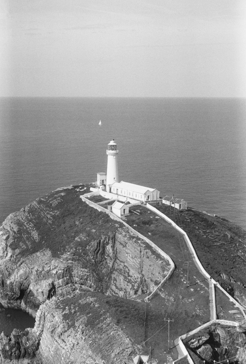 a lighthouse on a cliff