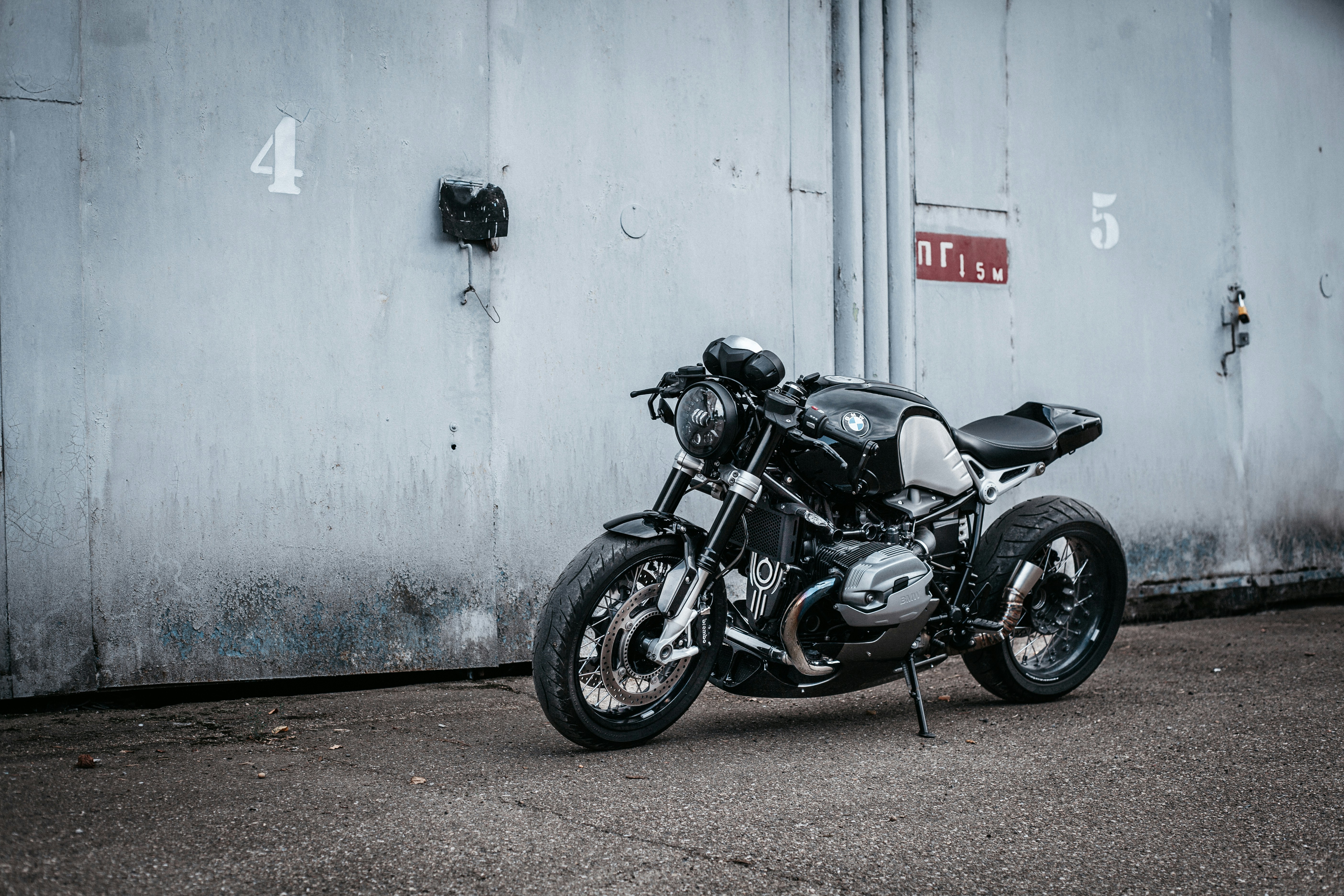 Motorcycle parked in front of garage