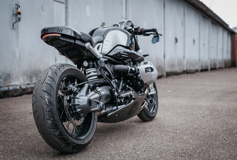 a motorcycle parked in front of a garage