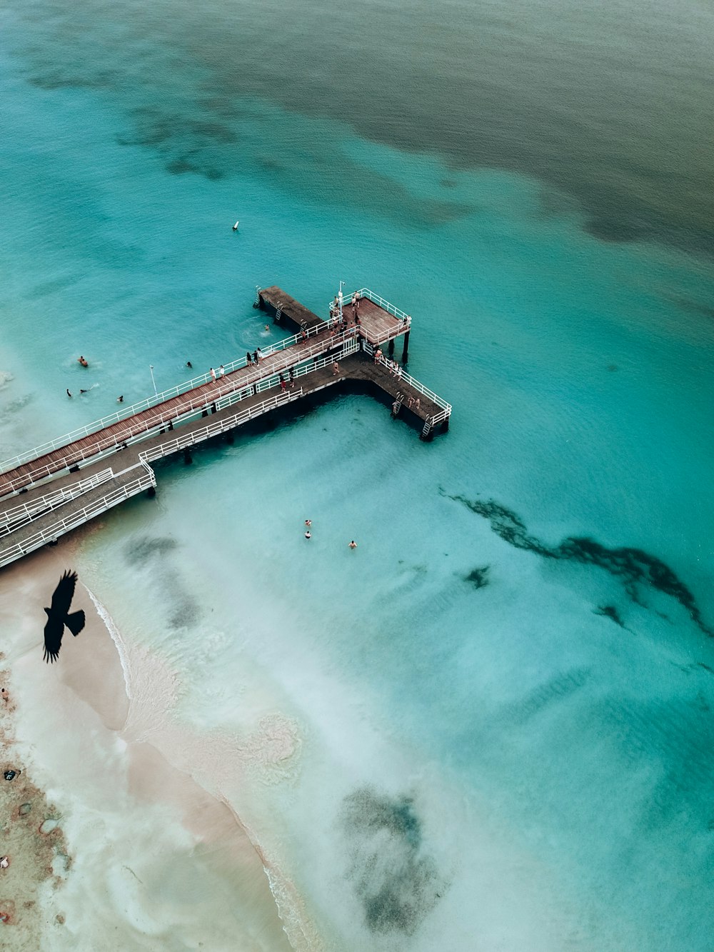 a large wooden structure in the water