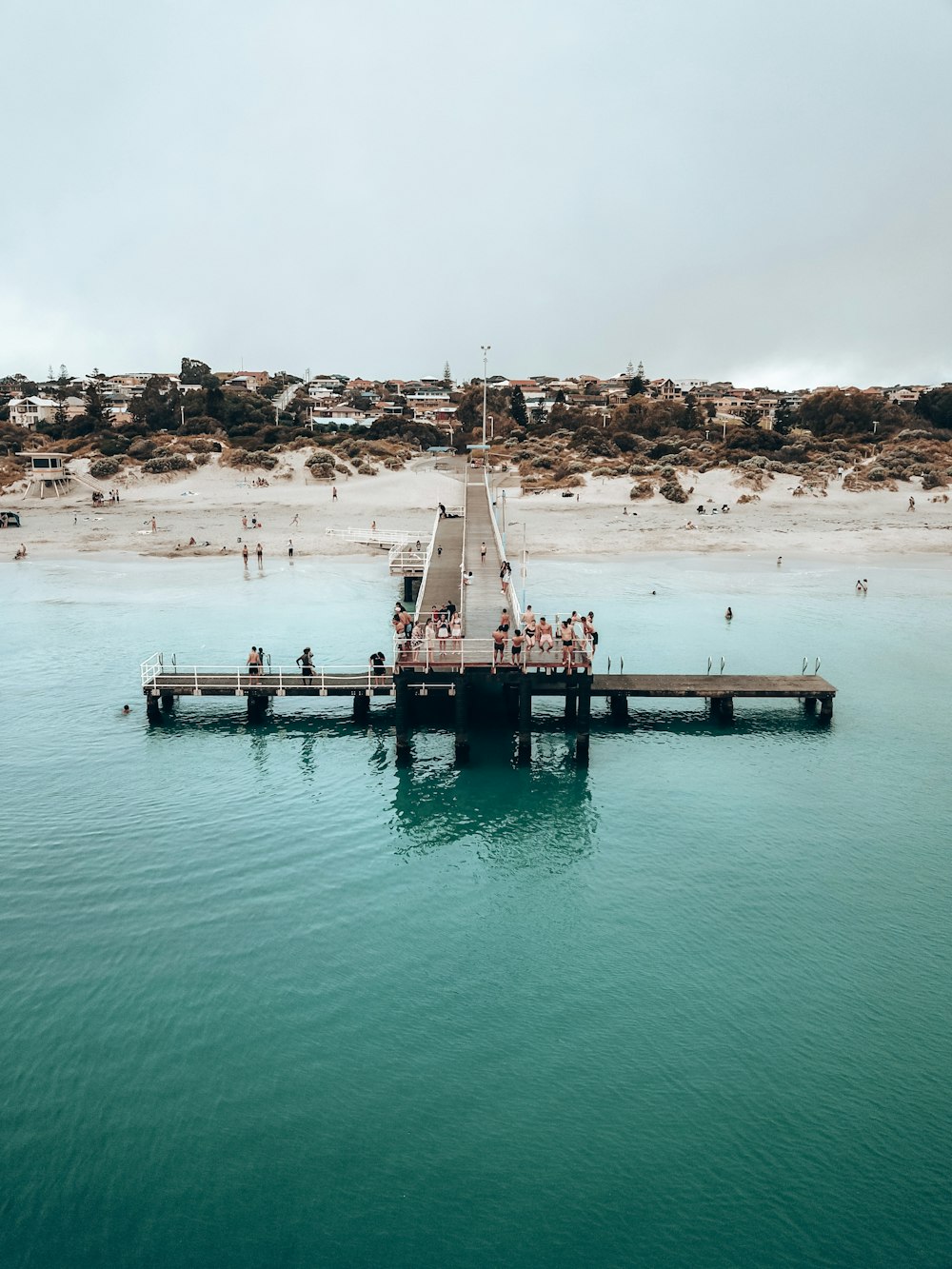 a group of people on a dock