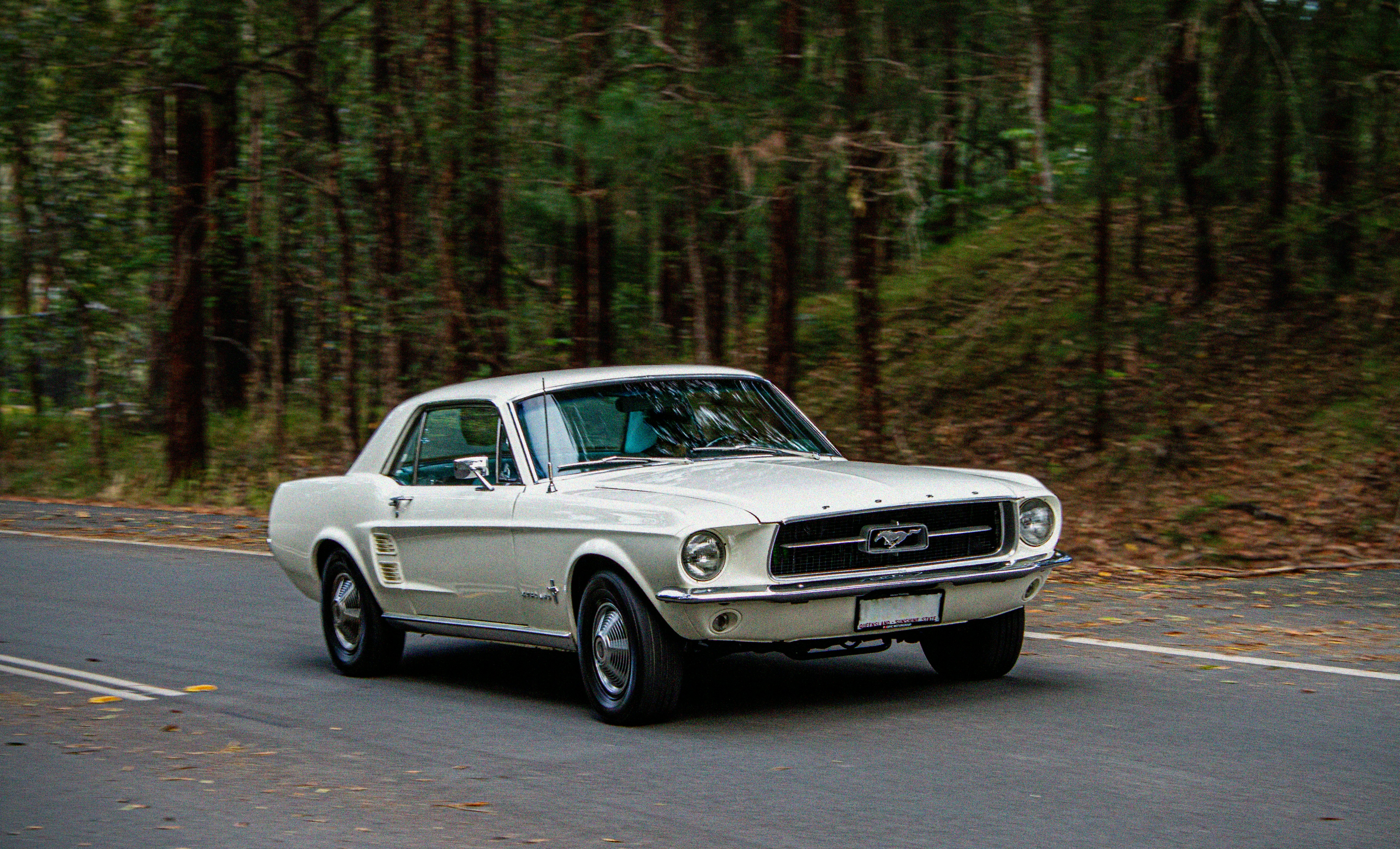 a white car parked on a road