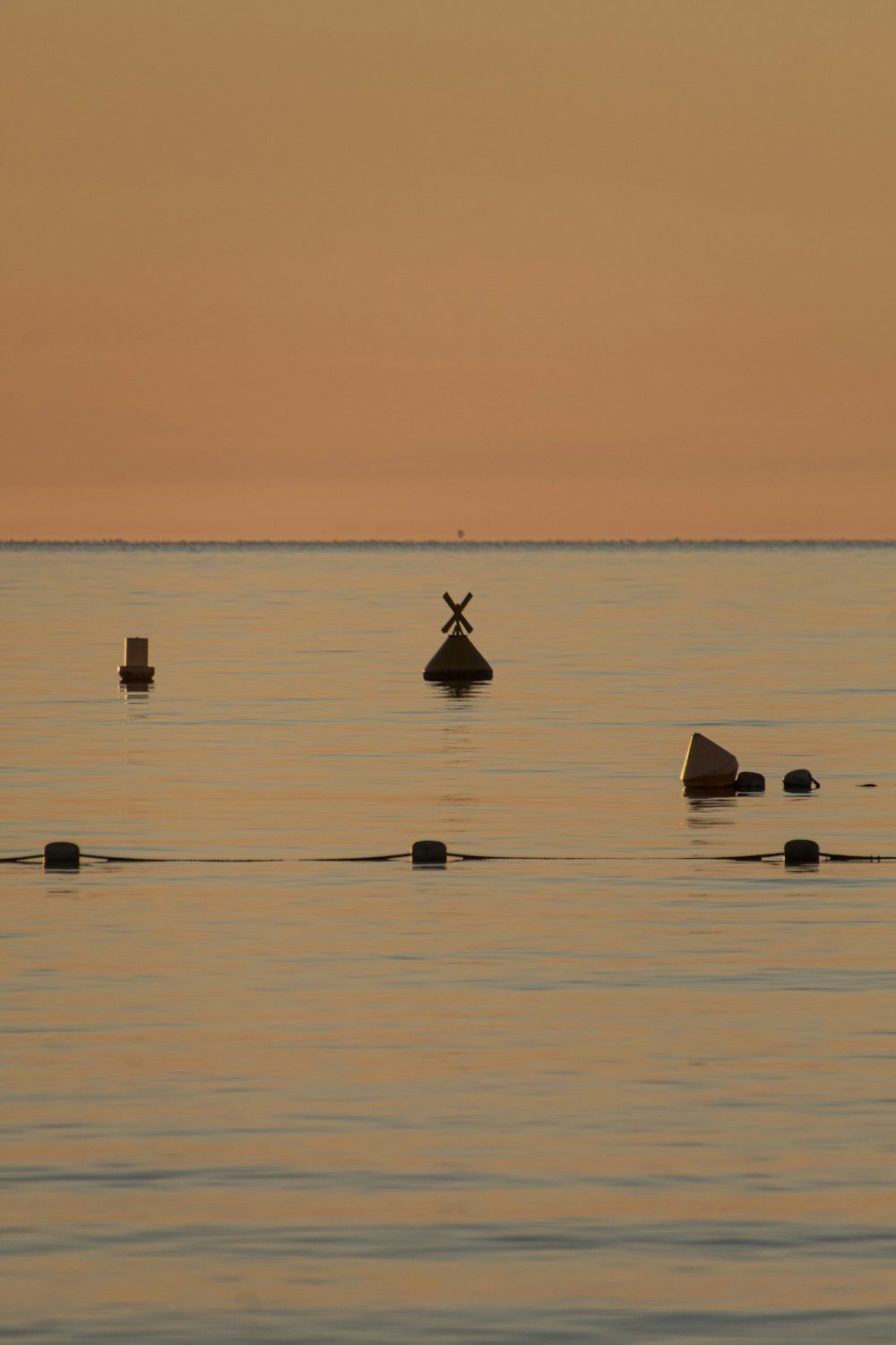 a group of rocks in the water