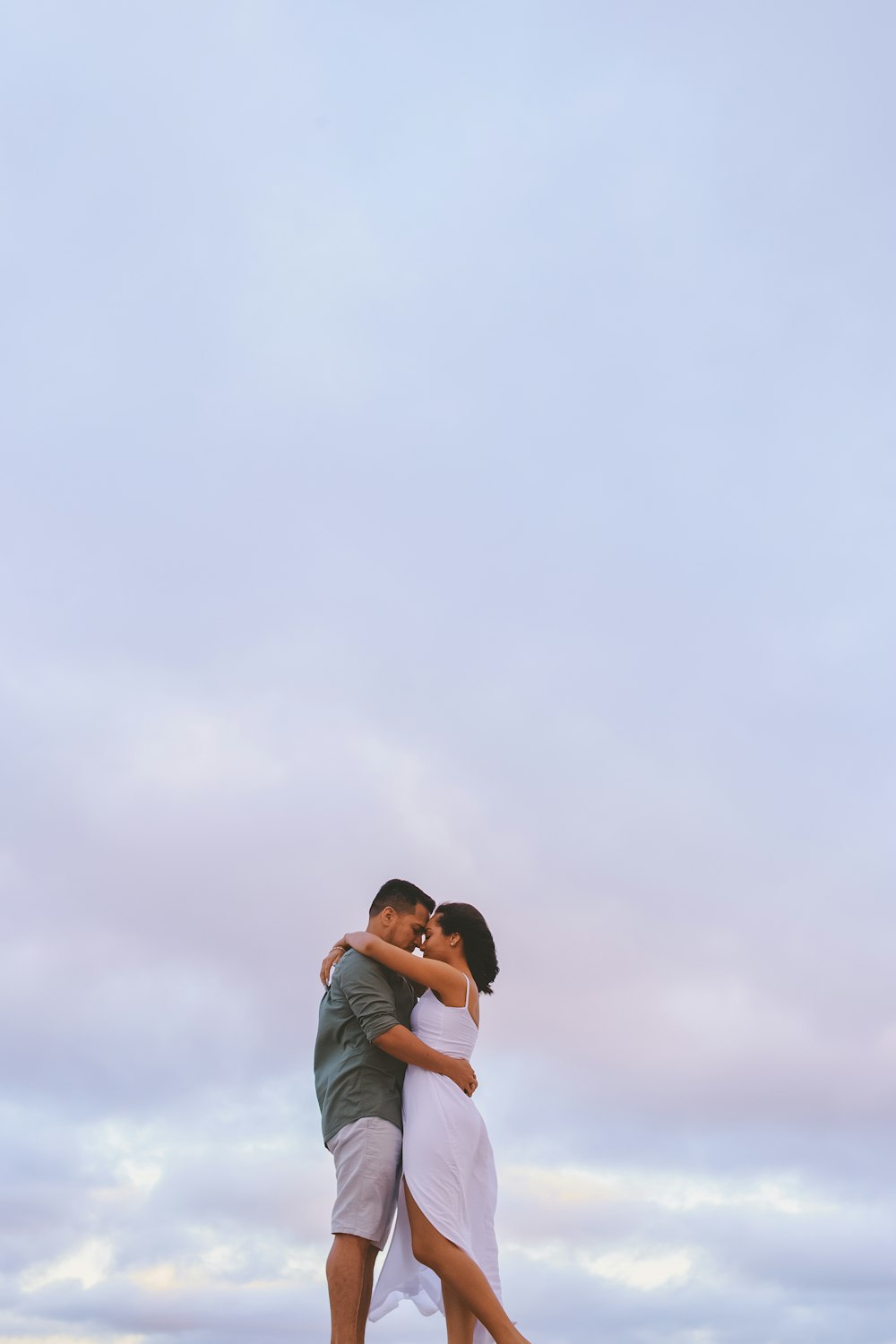 a man and woman kissing