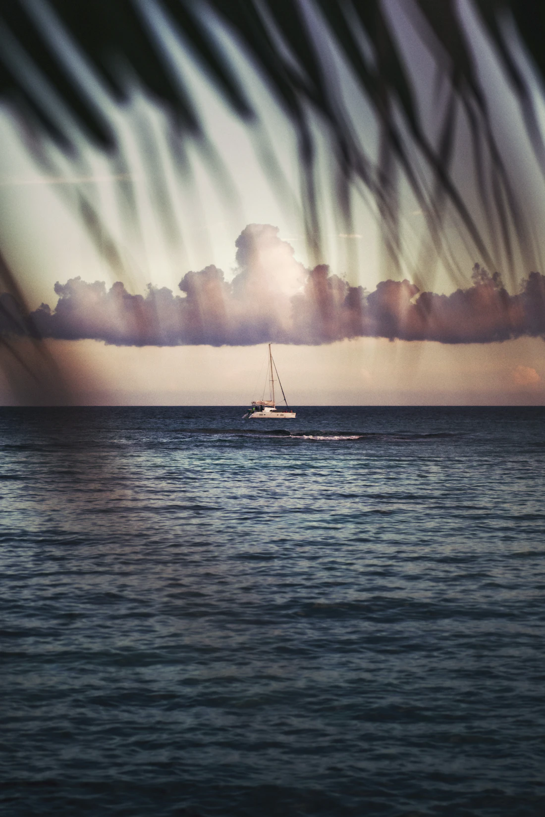 A boat on calm Caribbean water in the Riviera Maya