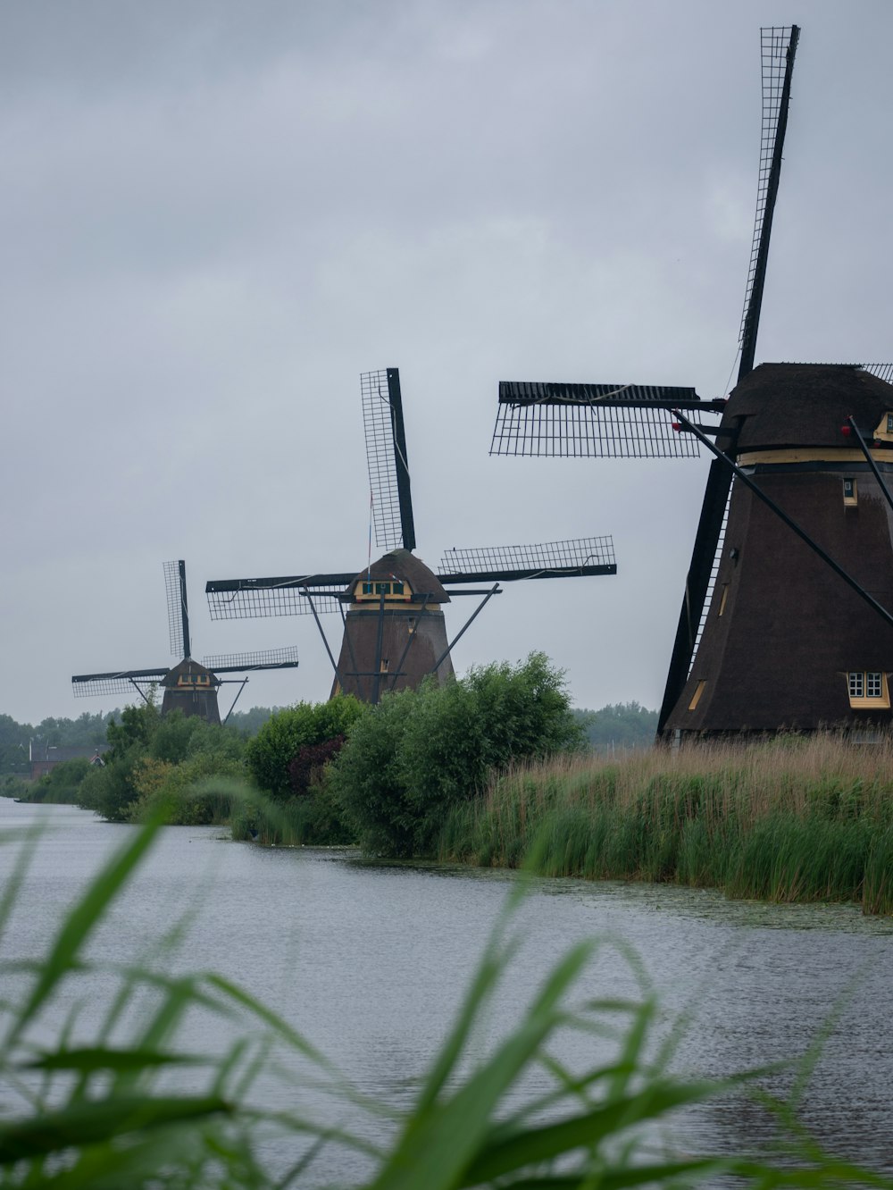 a road leading to windmills