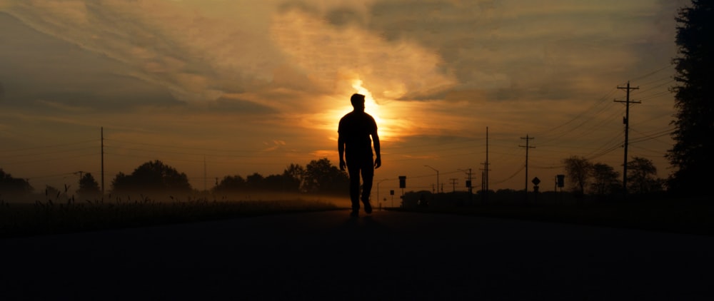 a person walking on a road