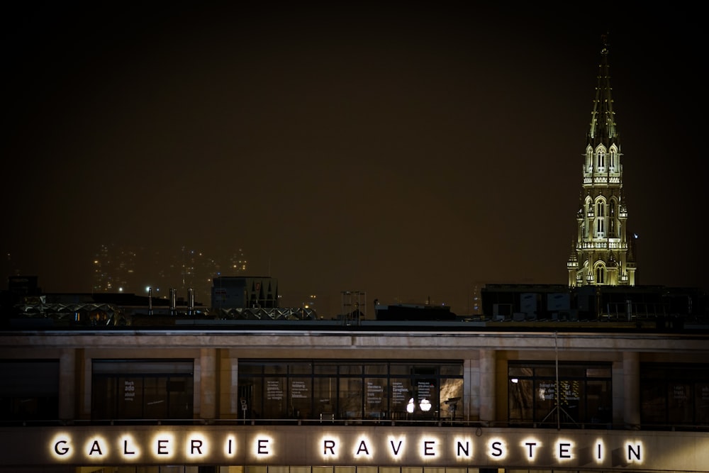 a building with a tower in the background