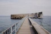a wooden dock over water