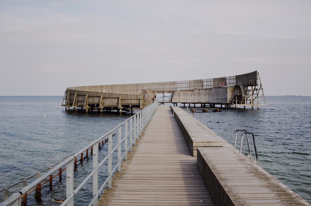 a wooden dock over water