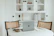 A cozy, minimalist workspace featuring sleek 3D printed desk organizers from Espacio Claro.