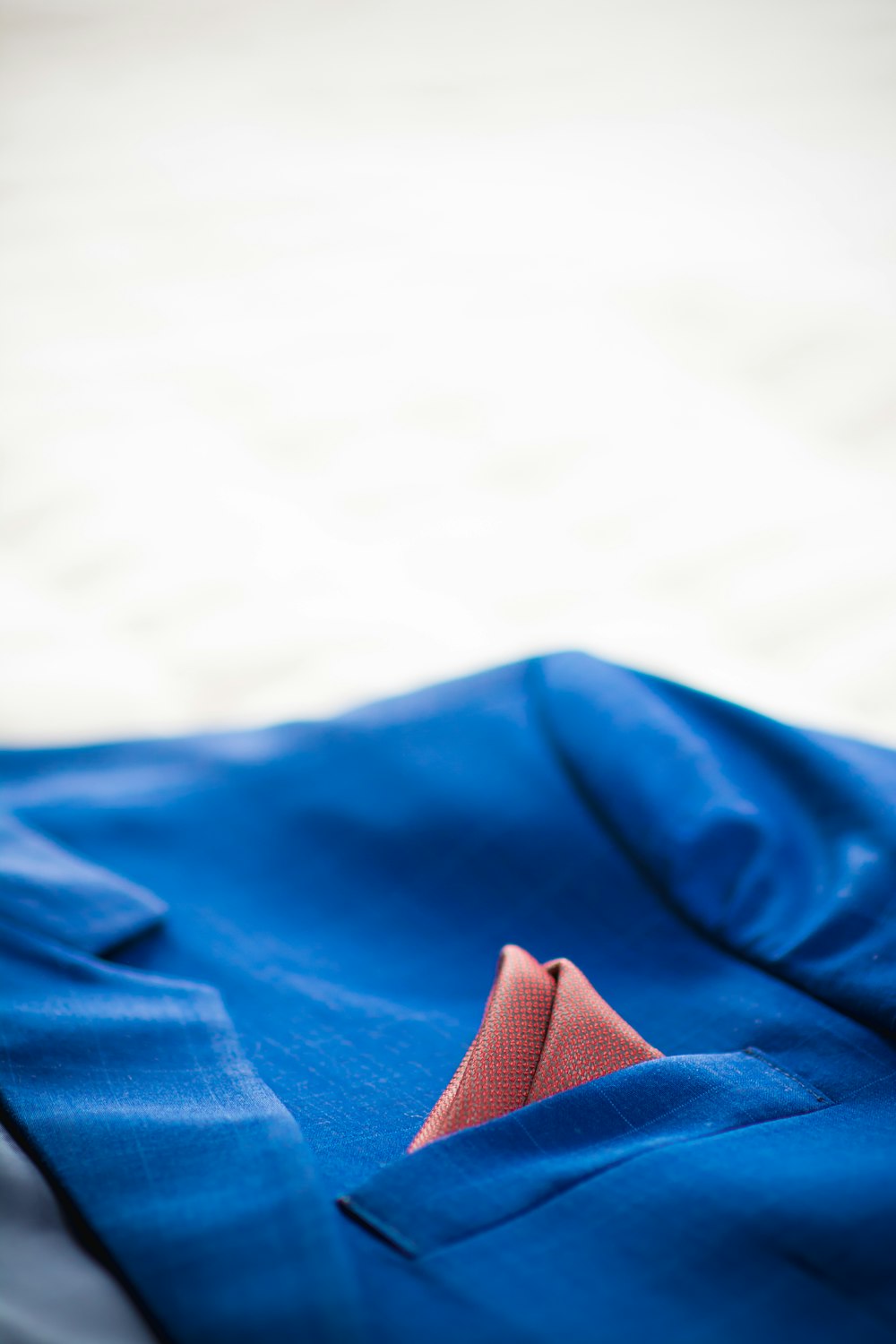 a person's feet on a blue blanket