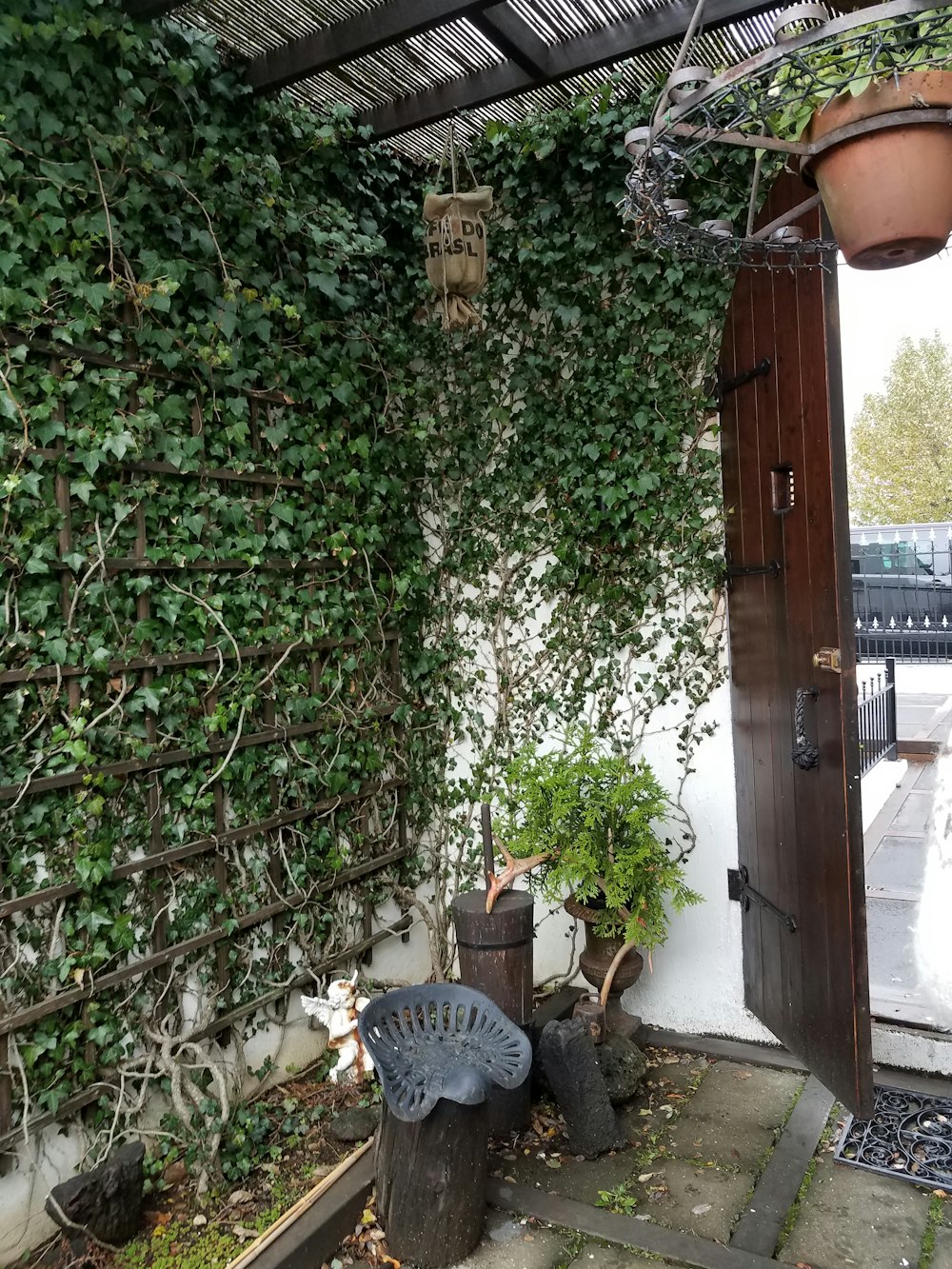 a house with a fence and plants