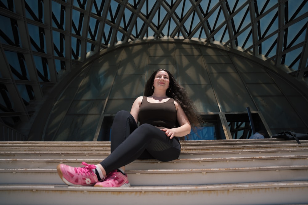 a woman sitting on a bench