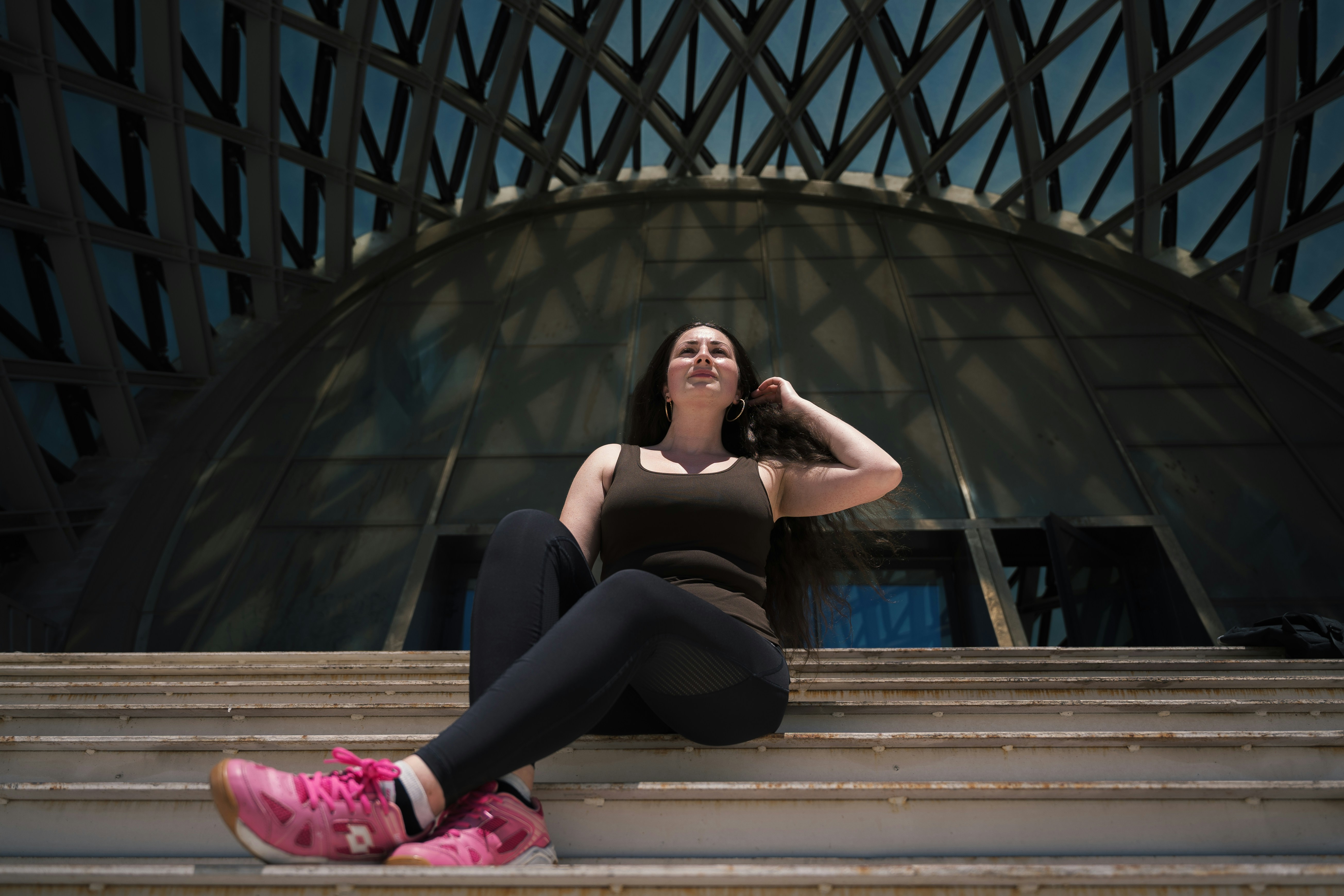 a woman sitting on a bench