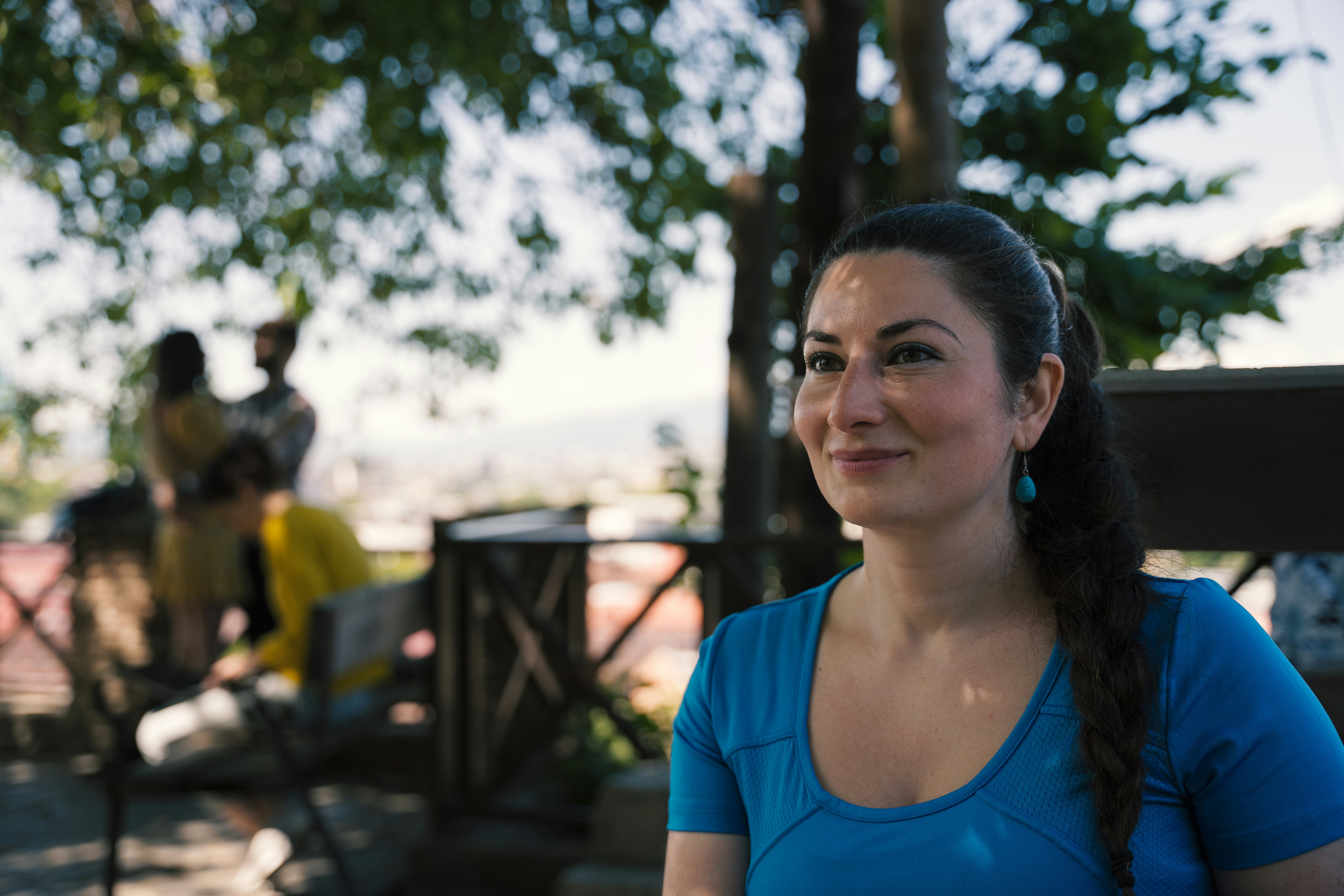 a woman in a blue shirt