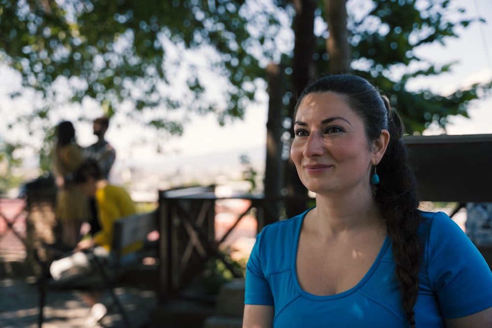 a woman in a blue shirt