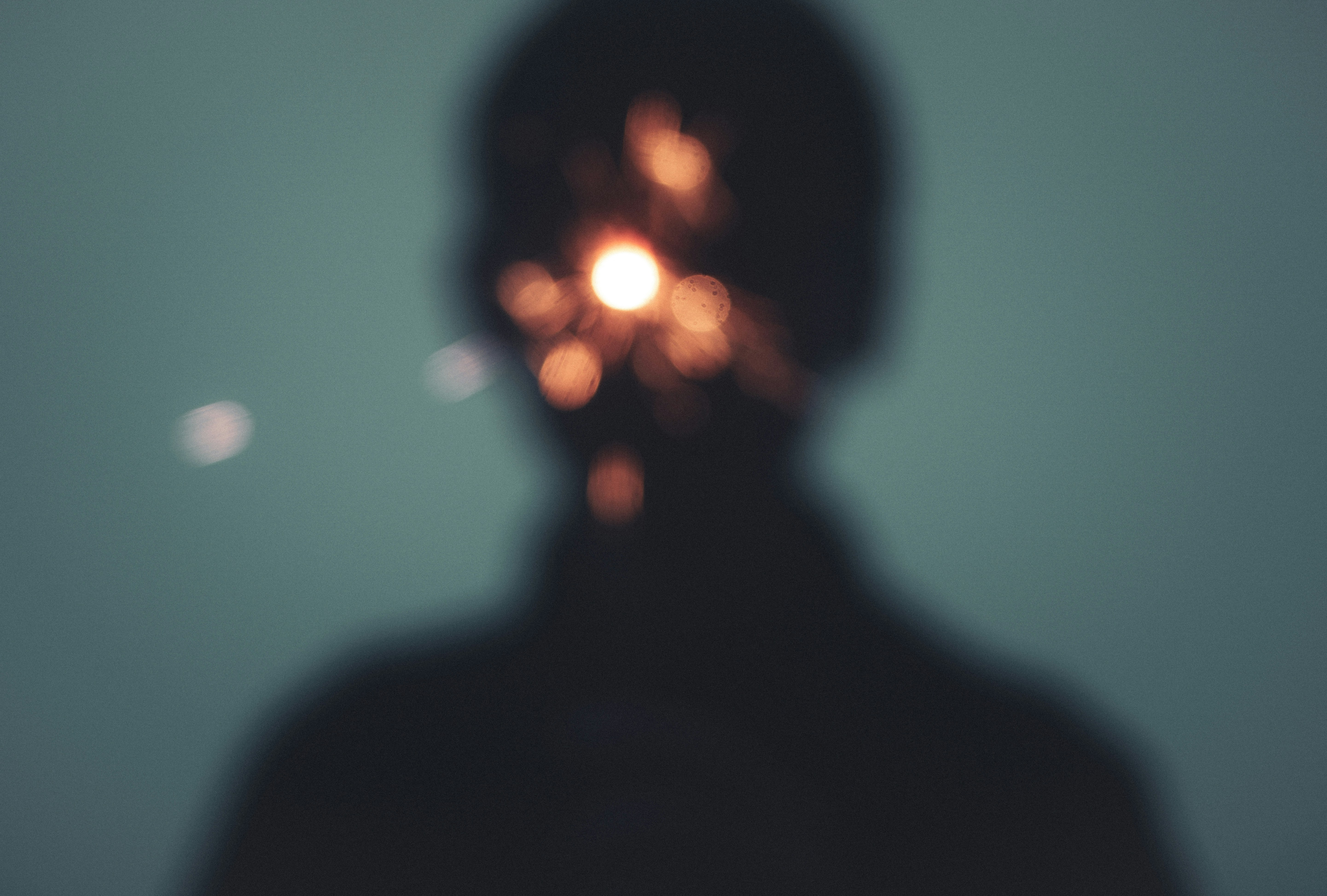 lightbulb turning on inside a person's head - Overcoming business challenges