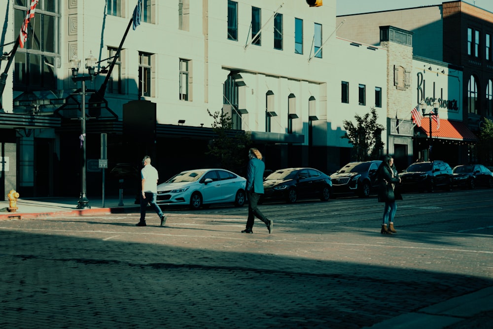 people walking on the sidewalk