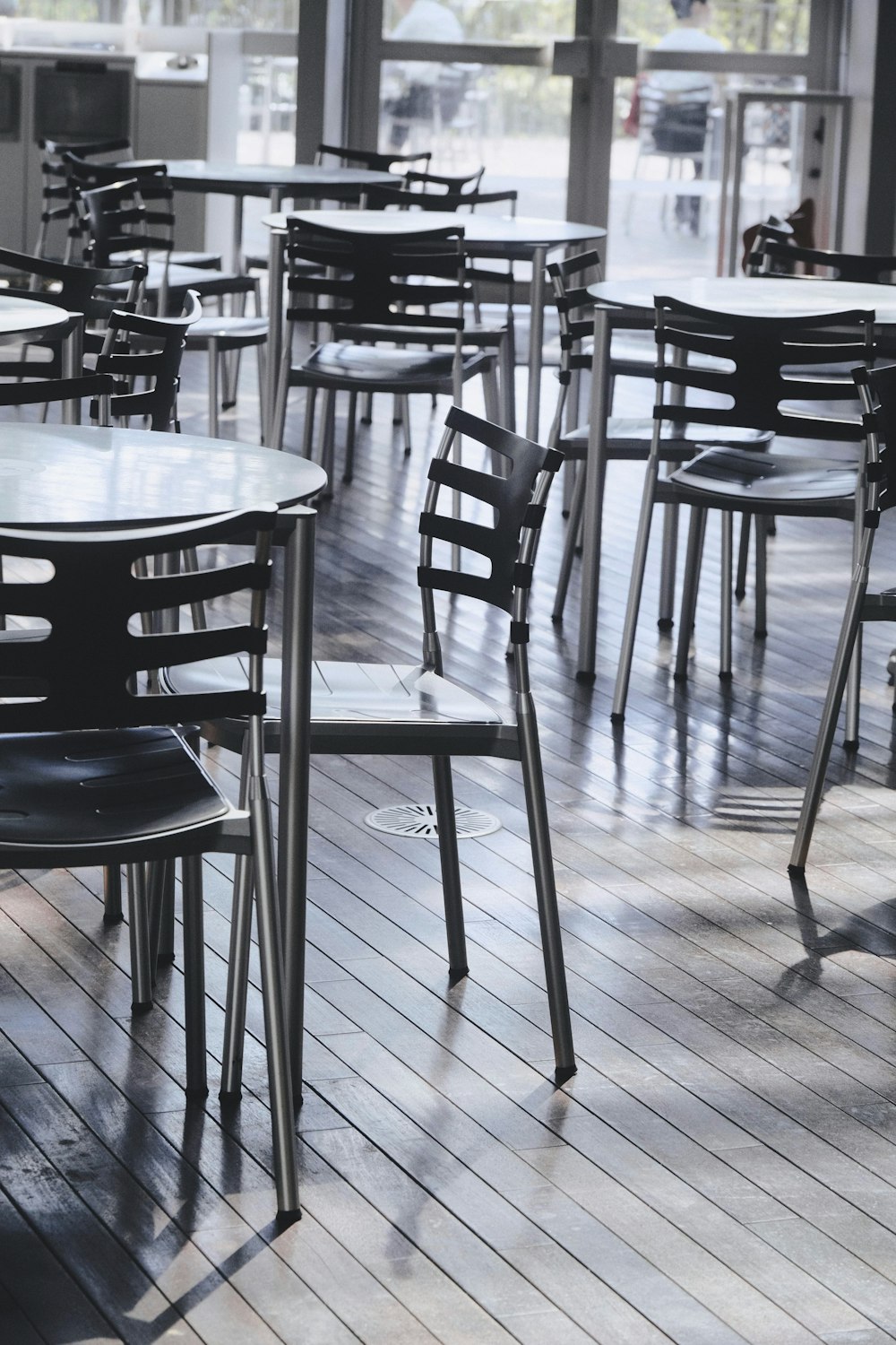 a group of tables and chairs