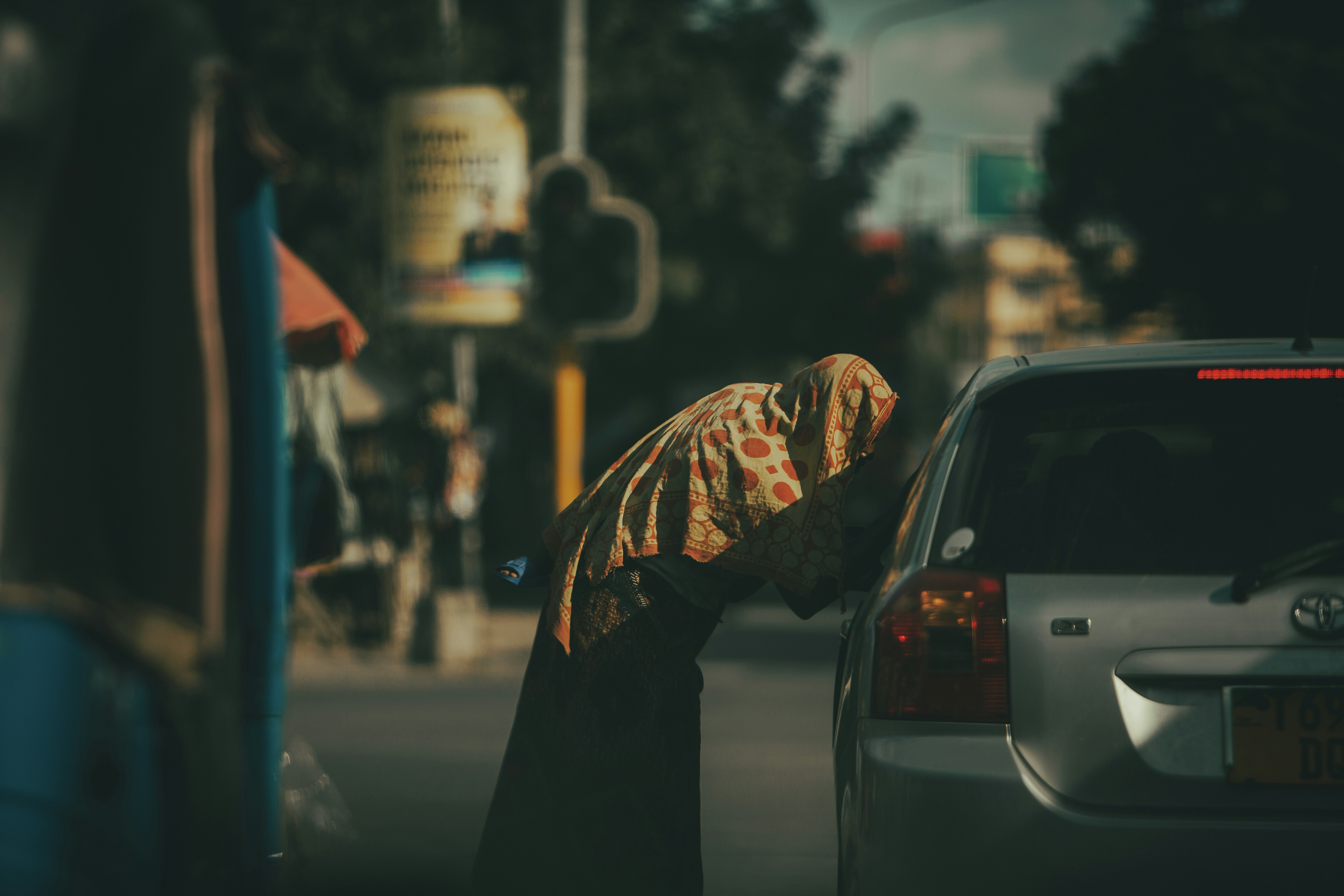 a person walking on the sidewalk