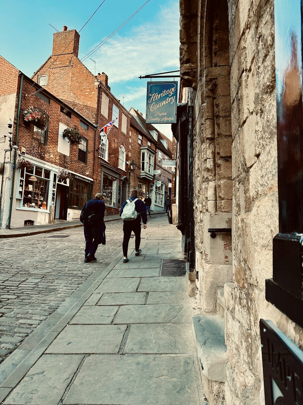 people walking down a street