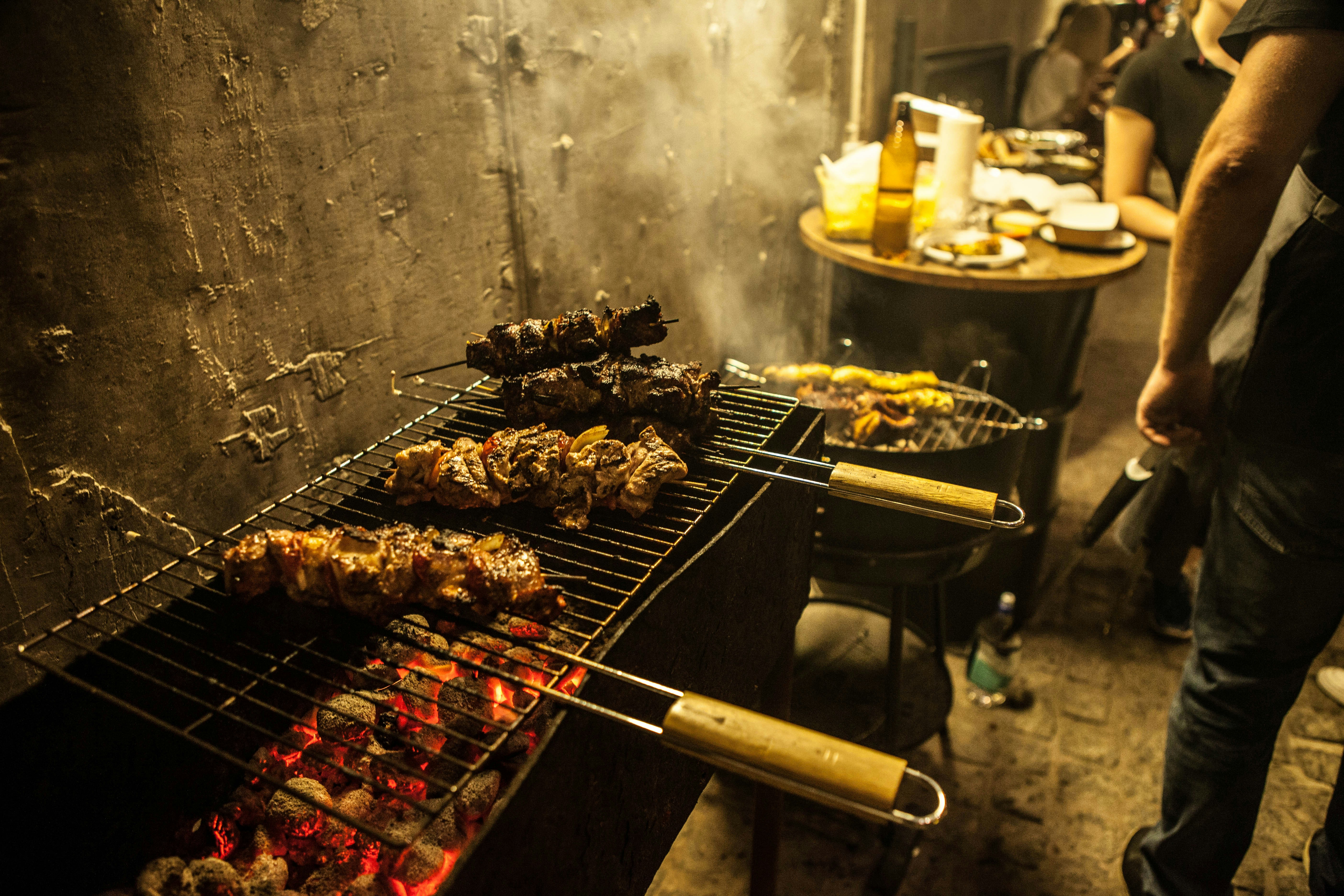 a grill with meat and vegetables