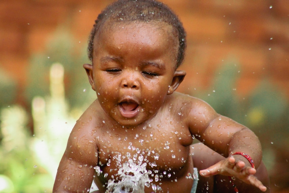 a baby with a big smile