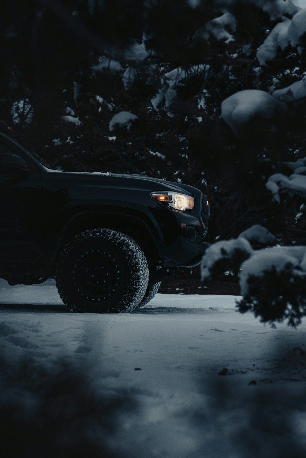 a car parked in the snow