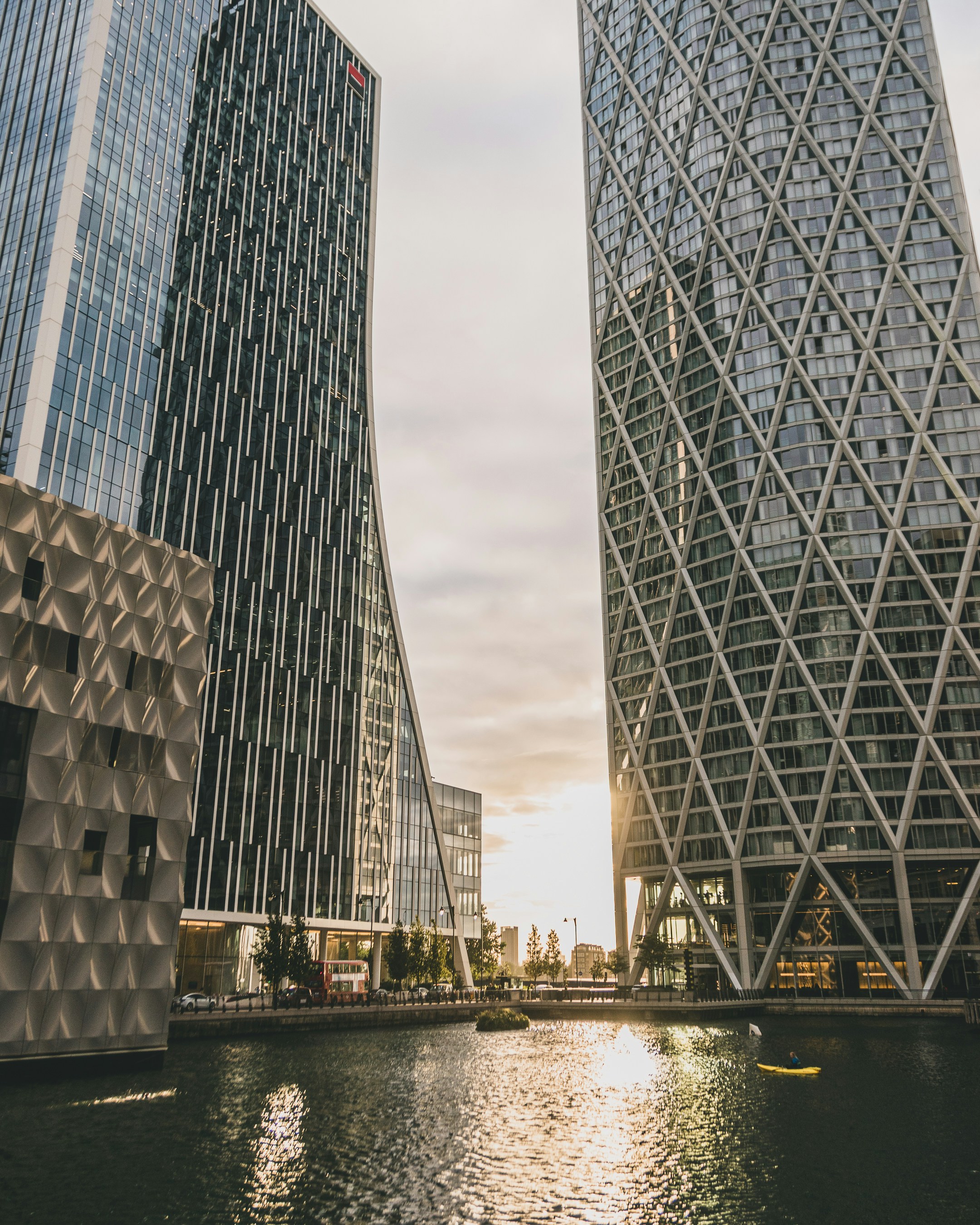 a body of water with tall buildings around it