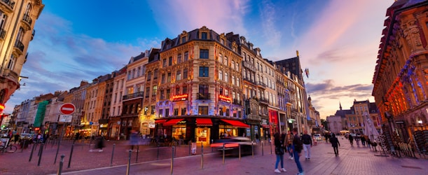 a group of people walking in a city