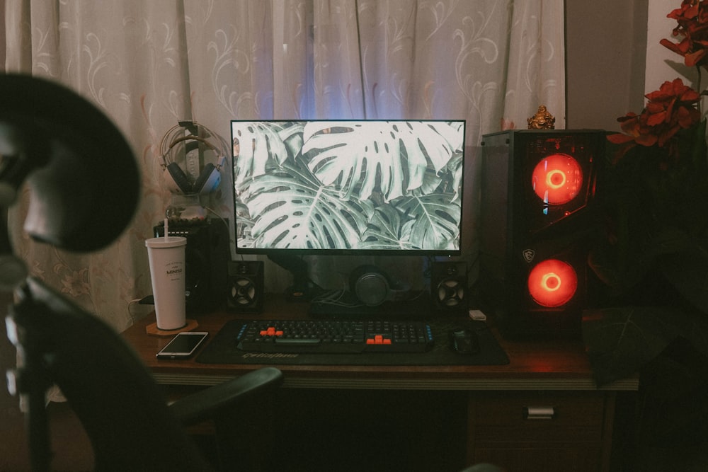 a person sitting in front of a computer