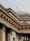 a building with a flag on top