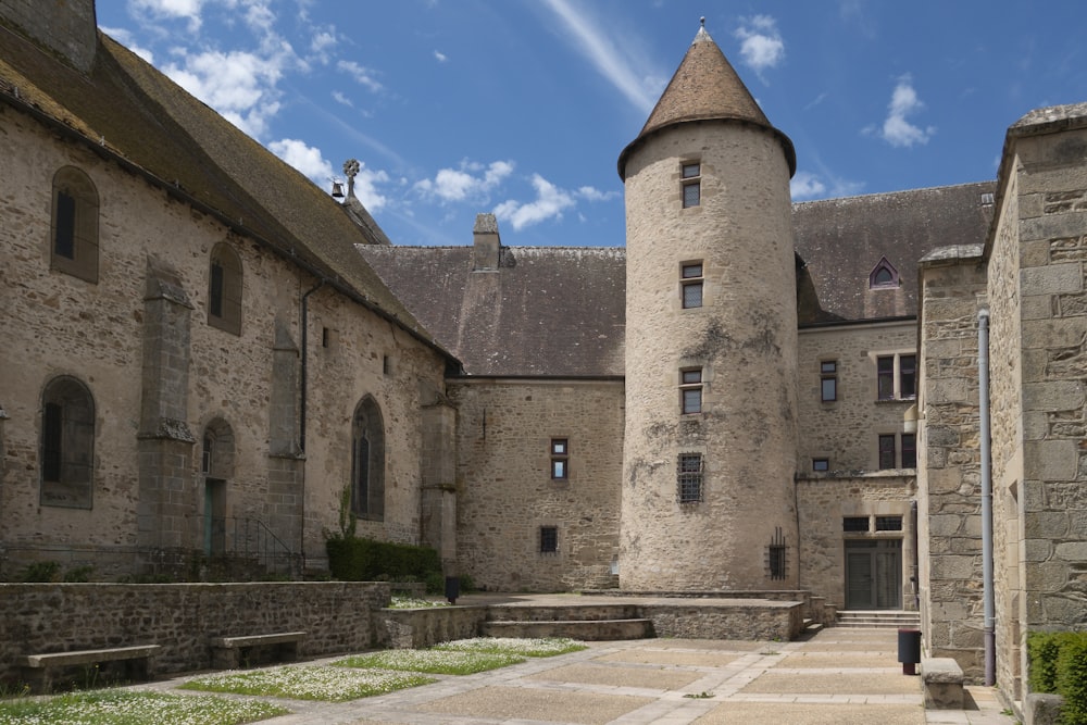 a stone building with a stone walkway