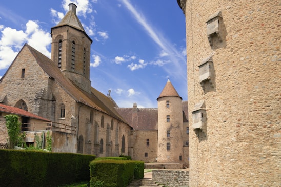 a stone building with a tower