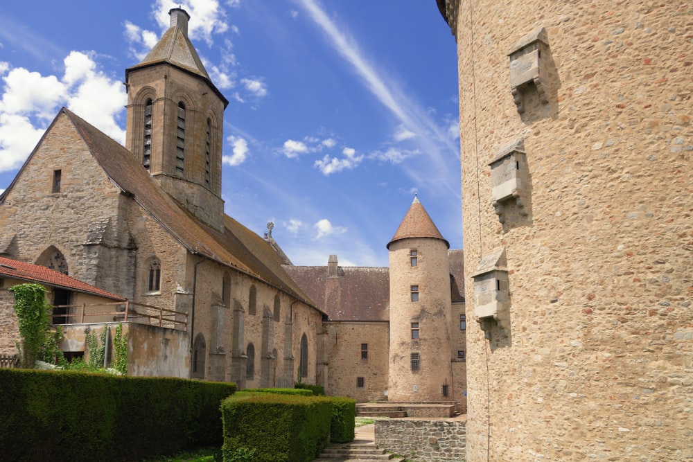 a stone building with a tower