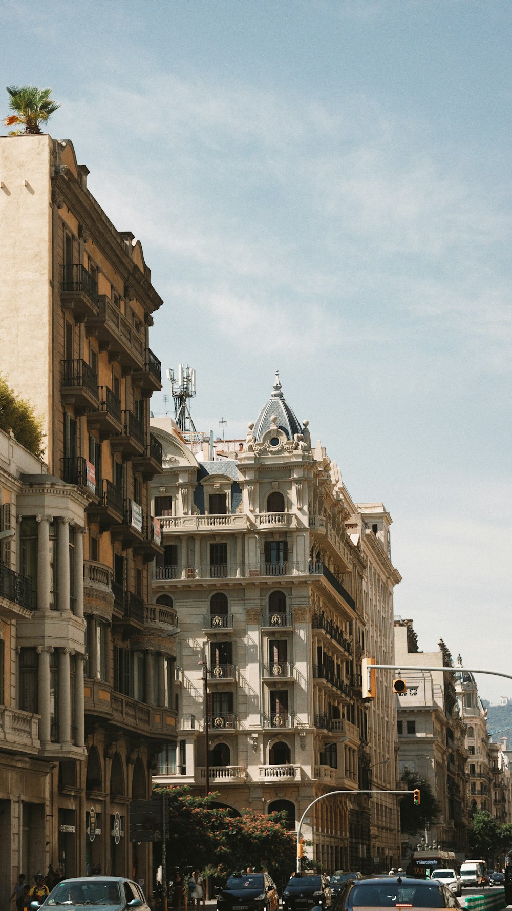 a street with cars and buildings on either side of it