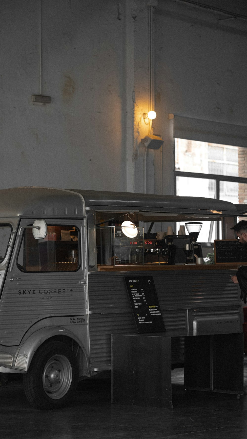 a food truck is parked in a building